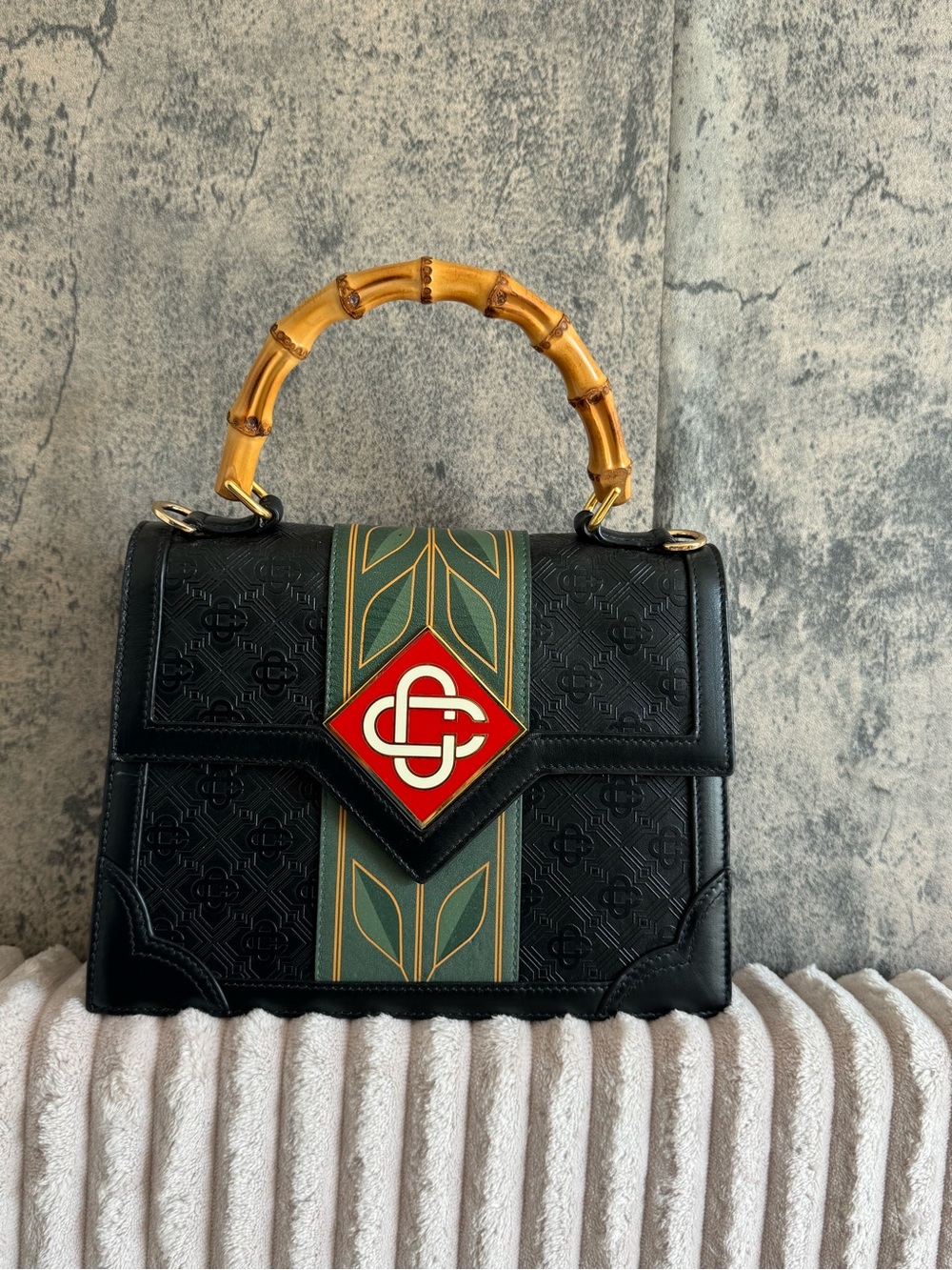 Black Satchel with Bamboo Top Handle and Green-Gold Stripe Accent